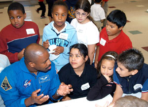 Melvin with students