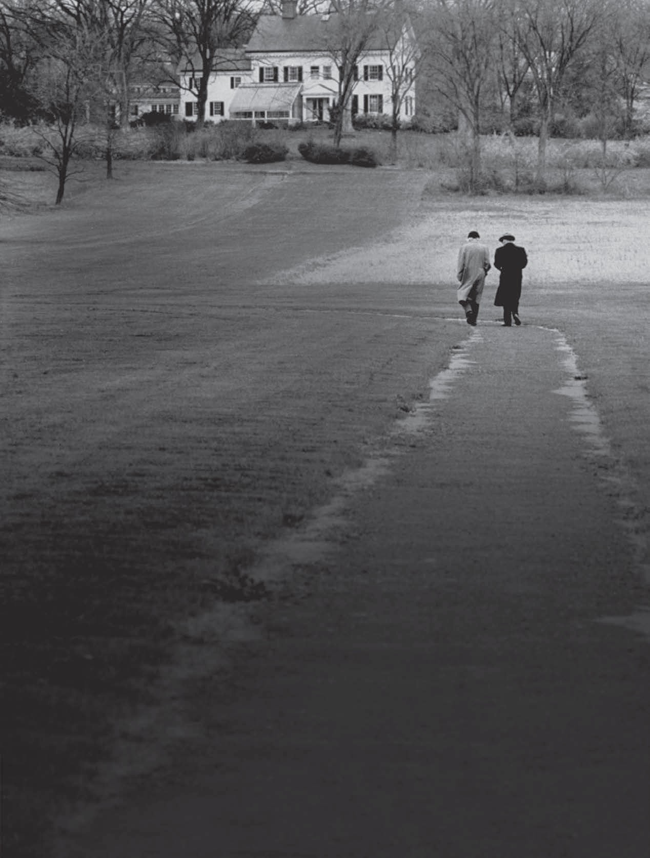 Kurt Godel, right, Albert Einstein, left, taking a walk in Princeton, 1954.jpg