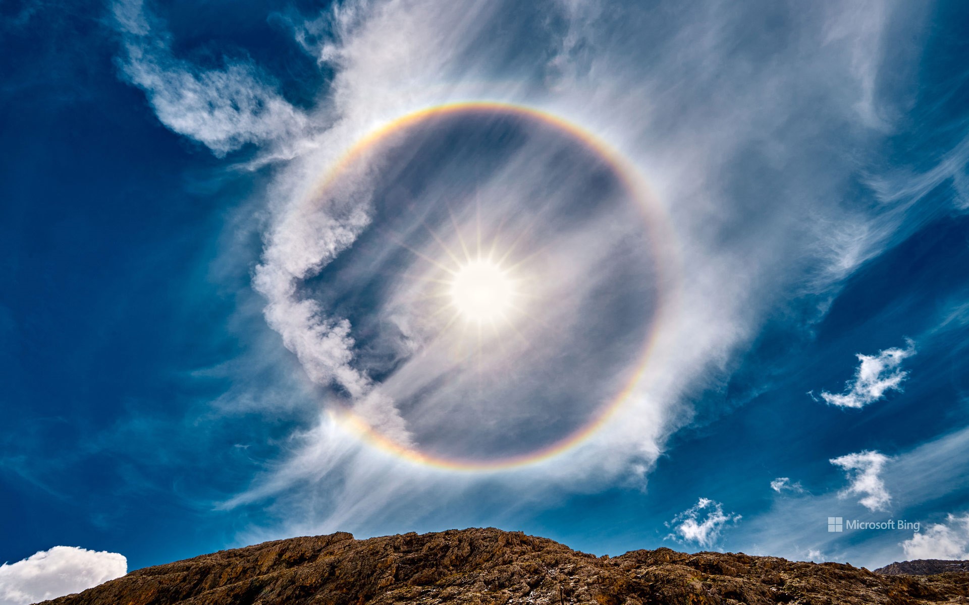 BingWallpaper 2022-12-22 Rainbow around the sun.jpg