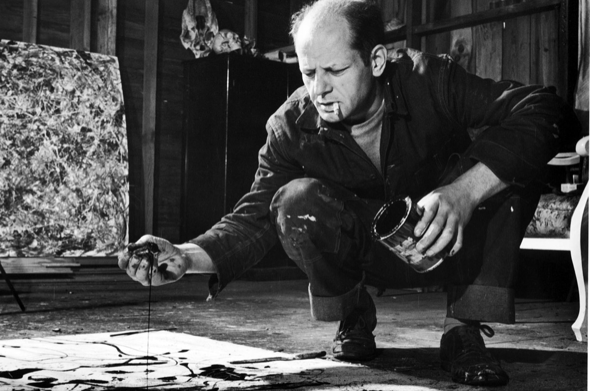 Jackson Pollock working in his Long Island studio adjacent to his home in 1949  .jpg
