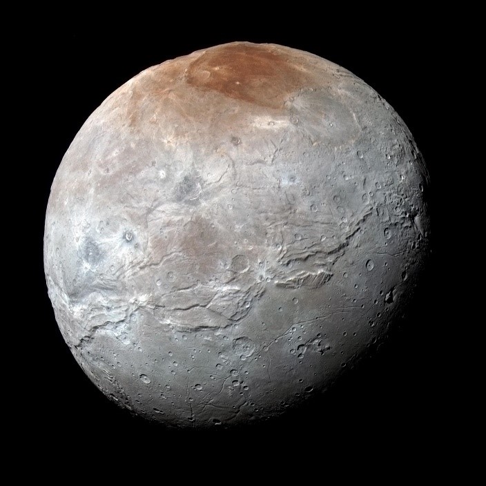 Enhanced color view of Pluto's largest moon, Charon.jpg