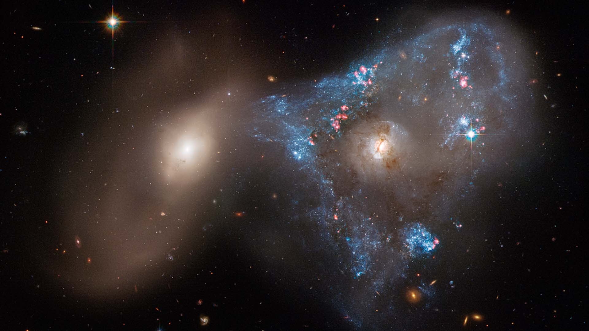 Hubble captures stunning image of galaxy collision.jpg