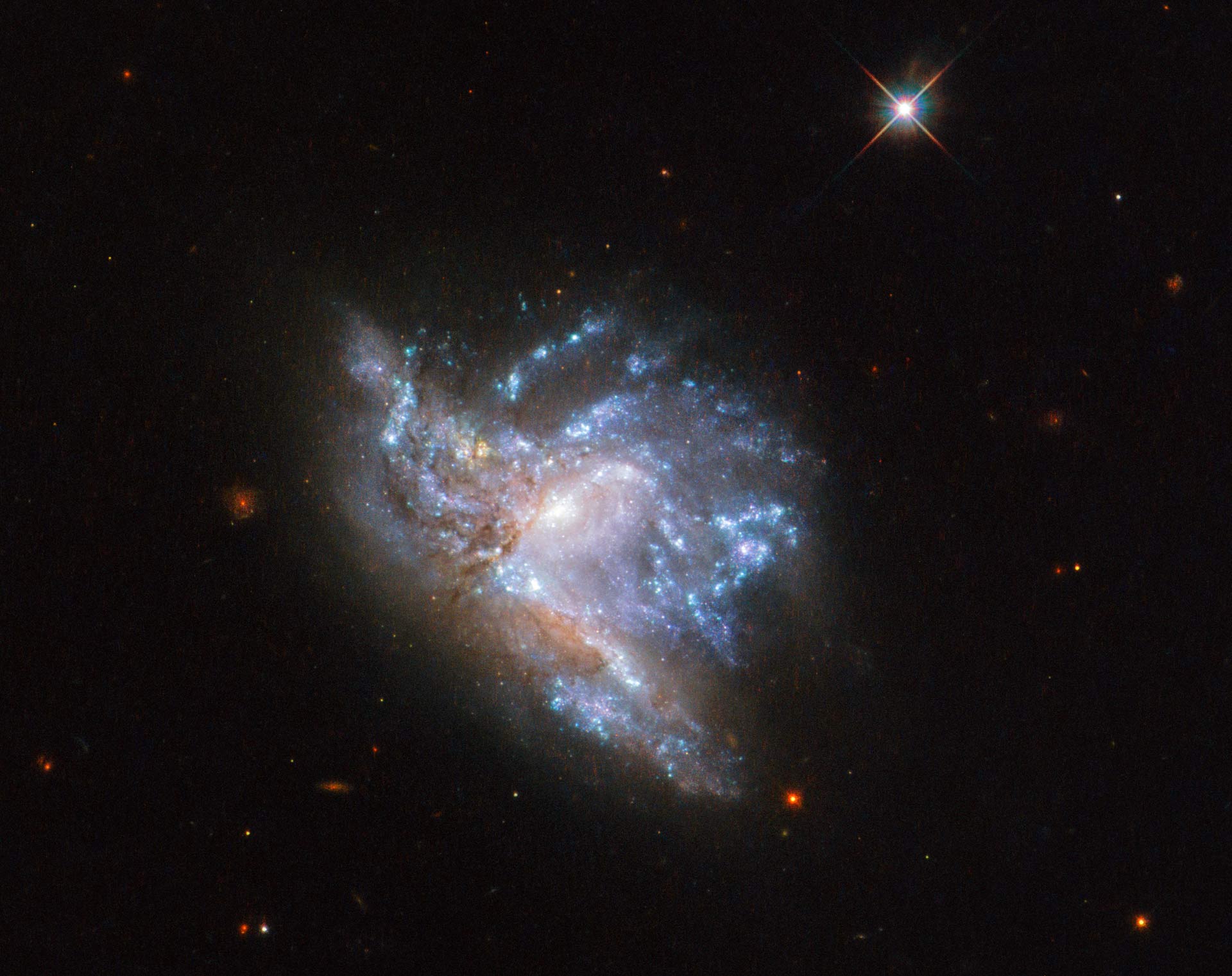 Spectacular Galaxy Collision Captured by Hubble  NGC 6052.jpg