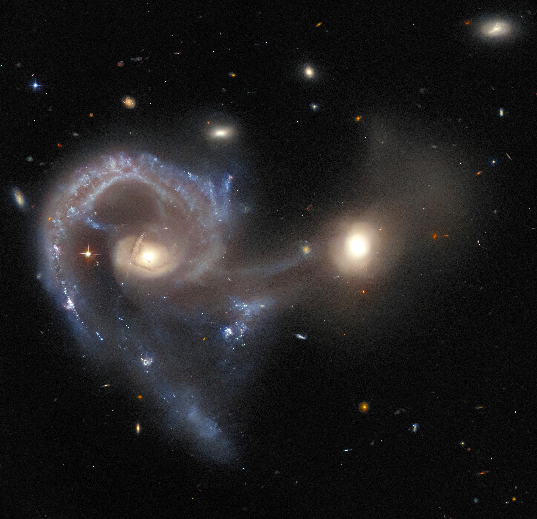 Seyferts Symphony Hubble Showcases a Breathtaking Galactic Collision.jpg