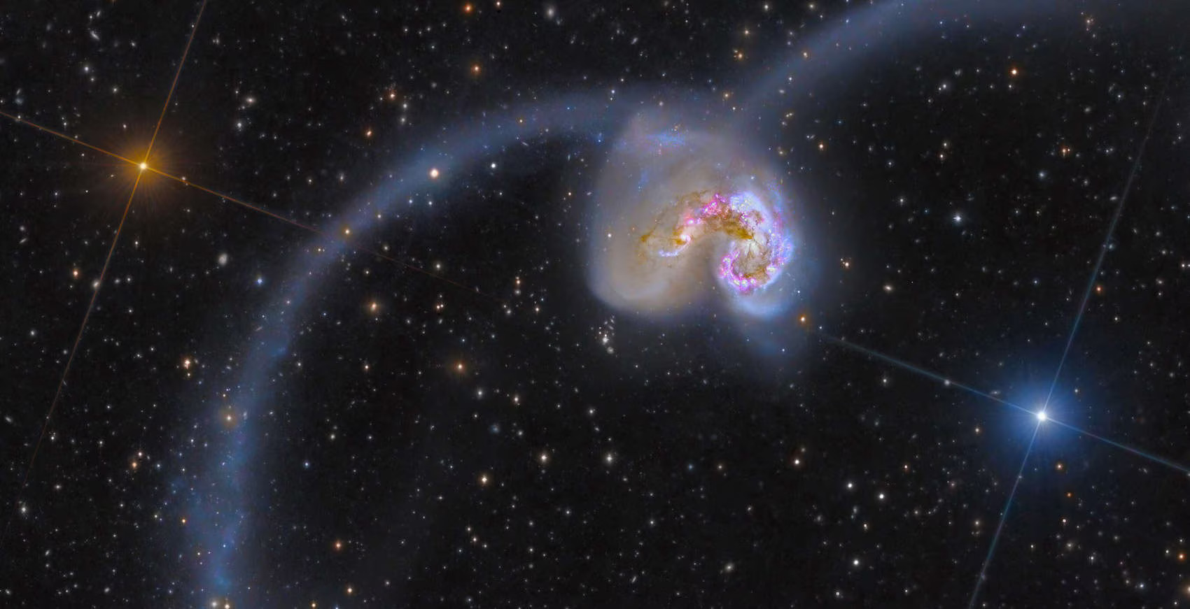 The Antennae Galaxies, a pair of colliding spiral galaxies 45 million light years away.jpg